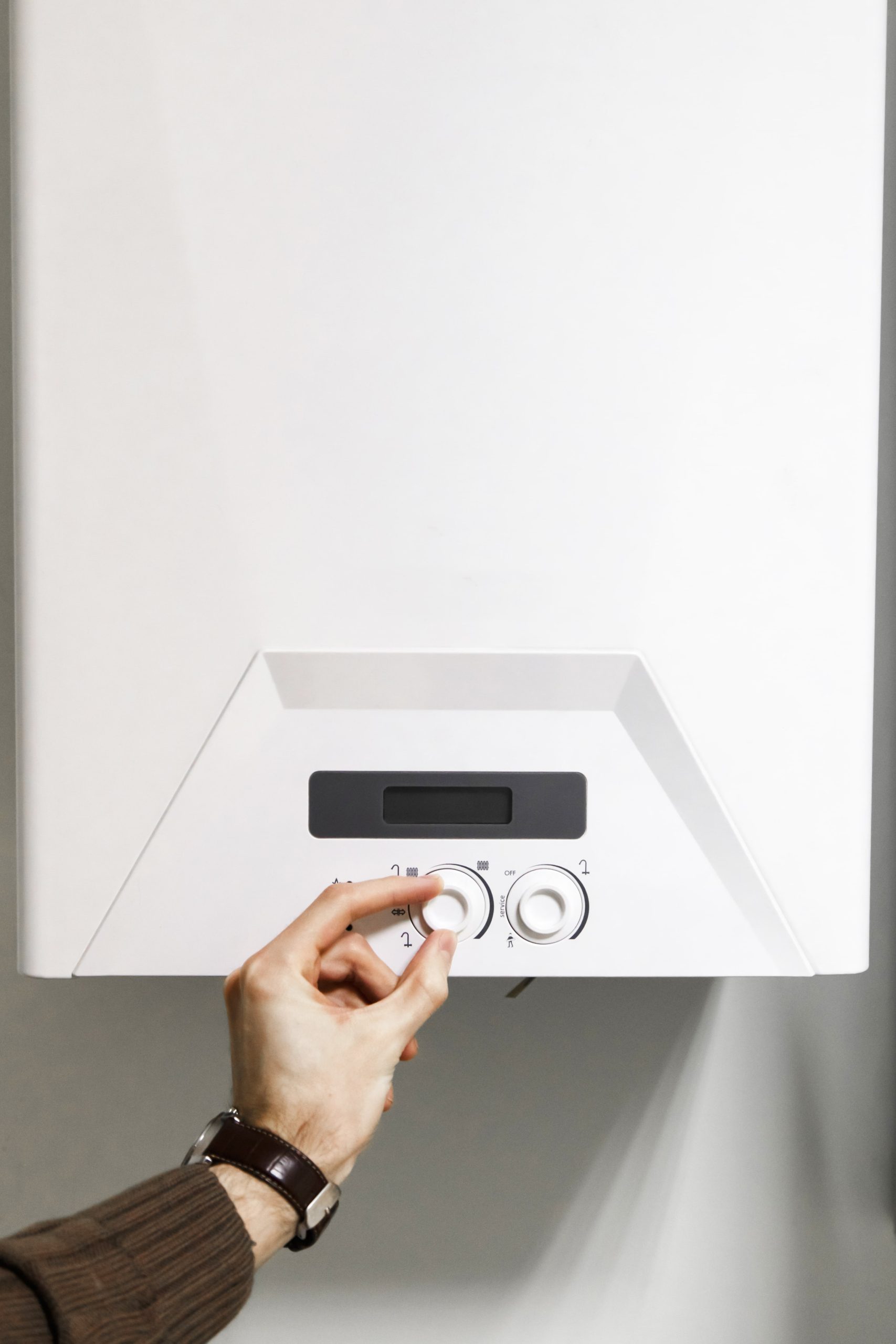 man-regulate-heating-boiler-control-panel-2022-12-16-21-56-15-utc-min man-regulate-heating-boiler-control-panel-2022-12-16-21-56-15-utc-min
